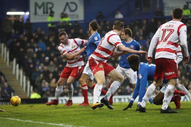 Brett Pitman scores Pompey's equaliser in the 81st minute after his introduction as a 59th-minute substitute against Doncaster Rovers Picture: Joe Pepler