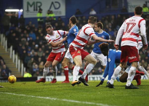 Brett Pitman scores Pompey's equaliser in the 81st minute after his introduction as a 59th-minute substitute against Doncaster Rovers Picture: Joe Pepler