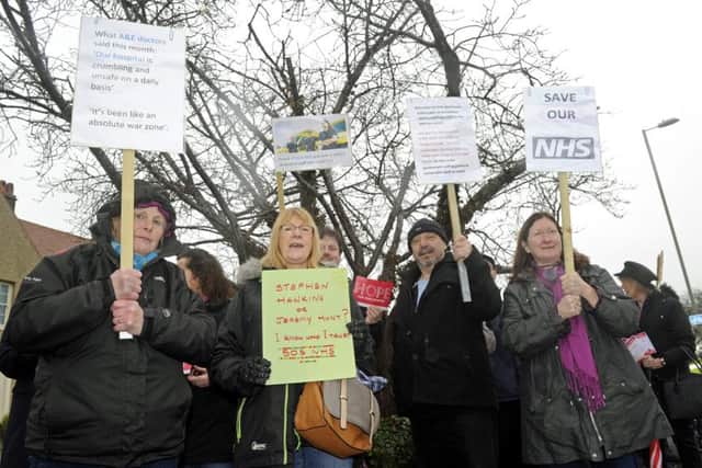 A group from the Gosport Labour Party stage a protest outside Gosport War Memorial Hospital highlighting the need for an A&E department     Picture Ian Hargreaves  (180190-1)