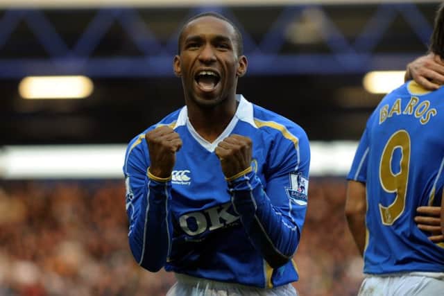 Jermain Defoe celebrates his debut goal against Chelsea.
