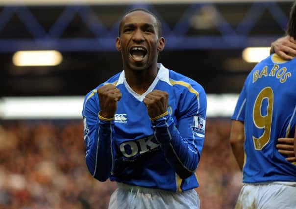 Jermain Defoe celebrates his debut goal against Chelsea.