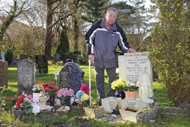 John Cox at the grave of his son Darren John Cox. Picture: Malcolm Wells (180202-5089)