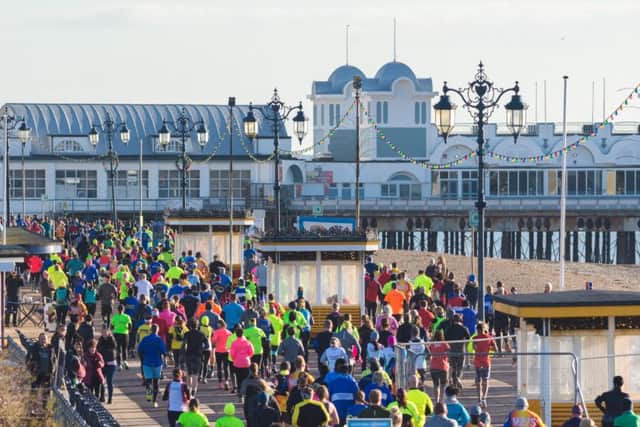 The runners heading out along by South Parade Pier. Picture: Vernon Nash (180056-005)
