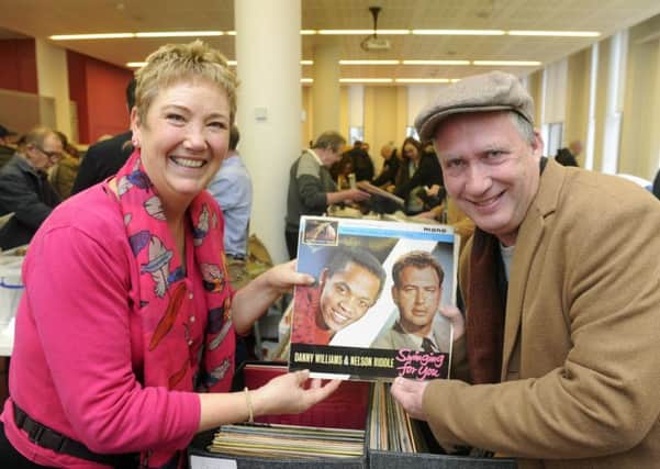 Julie Stokes with Colin Cheater of Angel Radio in Havant, at the record fair in Gosport          
Picture: Ian Hargreaves  (180191-1)