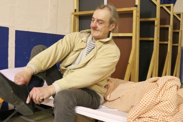Waldemar, a guest getting ready for bed at St Simons Church as part of the Open Church project