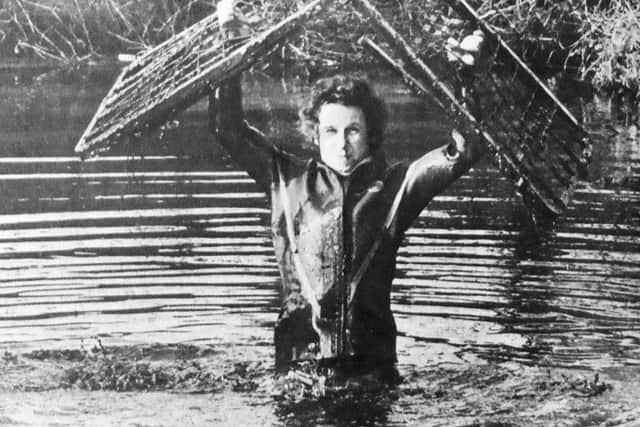 Ray Tyler, assistant Scout leader, pictured with the beadstead he found in Blendworth village pond