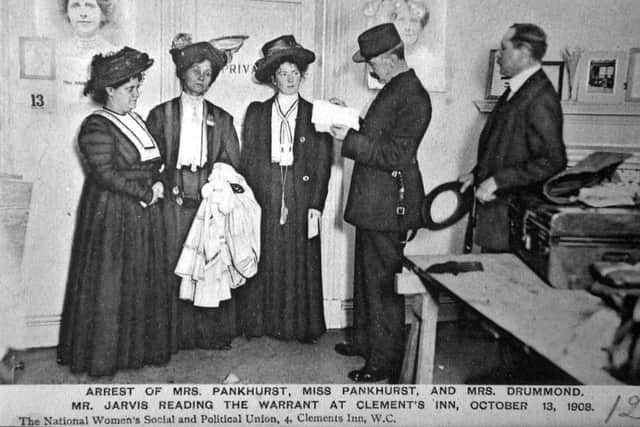 Emmeline Pankhurst (second left) being arrested in London