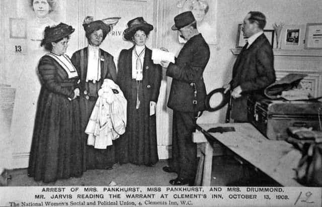 Emmeline Pankhurst (second left) being arrested in London