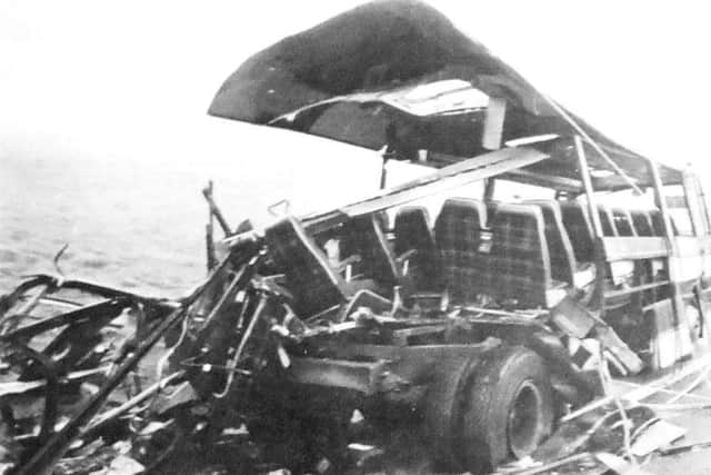 The shattered remains of the coach on the M62
