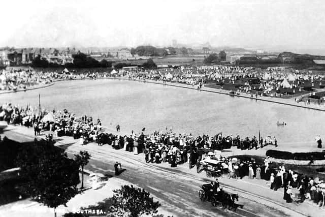 A packed Canoe Lake area in Edwardian days. It might have been a Bank Holiday perhaps. Note the carriage in St Helen's Parade.