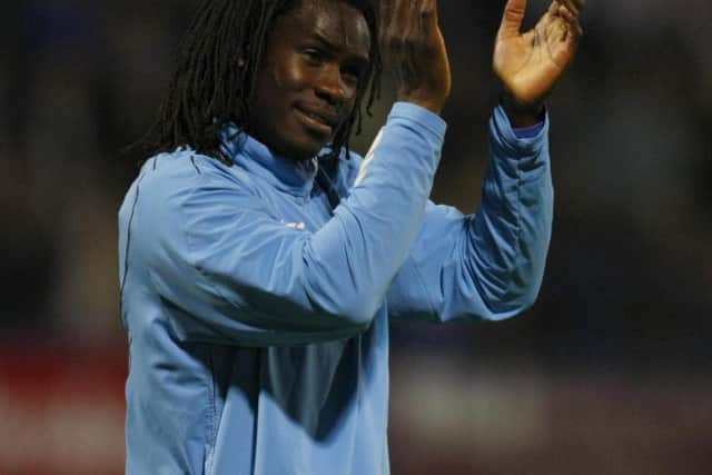 Linvoy Primus bids farewell to the Pompey fans after his substitute appearance against Sunderland in 2009