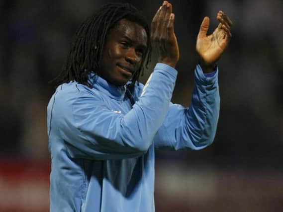 Linvoy Primus bids farewell to the Pompey fans after his substitute appearance against Sunderland in 2009
