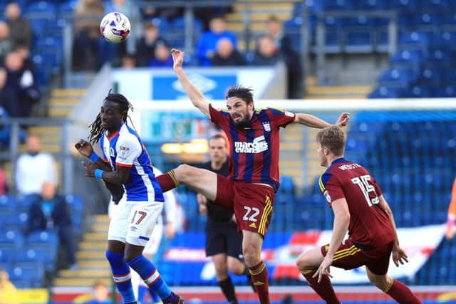 Former Ipswich midfielder Jonathan Douglas is on trial for Pompey.