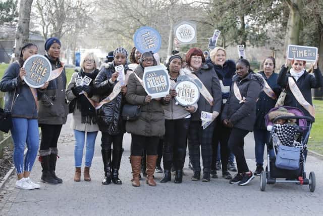 Women march through the centre of Portsmouth to help raise awareness for Female Genital Mutilation