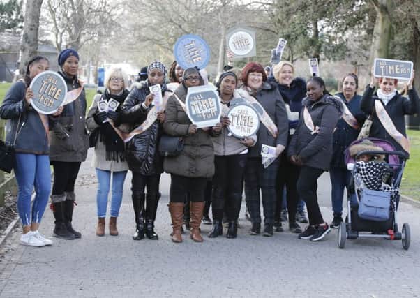 Women march through the centre of Portsmouth to help raise awareness for Female Genital Mutilation