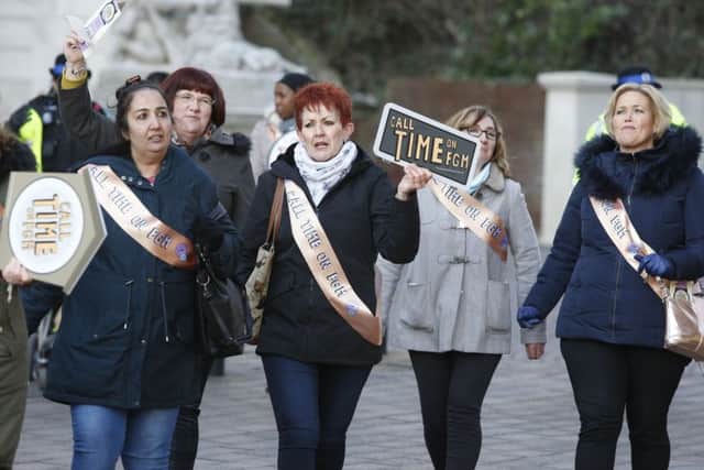 Women march through the centre of Portsmouth to help raise awareness for Female Genital Mutilation