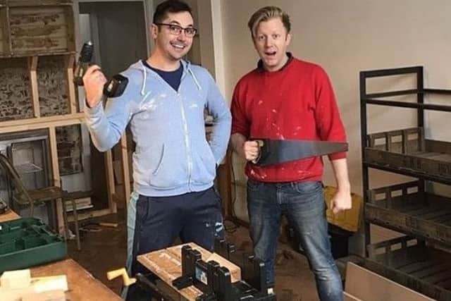 Michael McWilliam, left, and owner Daniel Nowland get the Southsea Deli ready for opening