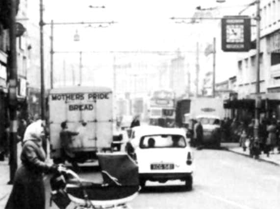Part of the photograph from last Monday of Commercial Road showing the Ford Anglia 105e.