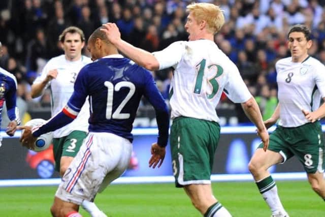 Thierry Henry in the infamous Hand of God II moment in the World Cup qualifier between France and the Republic of Ireland