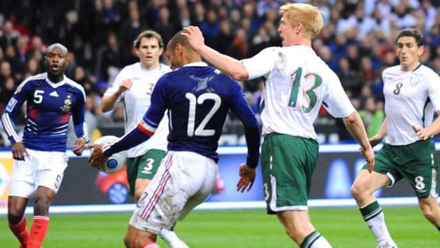 Thierry Henry in the infamous Hand of God II moment in the World Cup qualifier between France and the Republic of Ireland