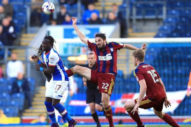 Former Ipswich midfielder Jonathan Douglas is on trial for Pompey.