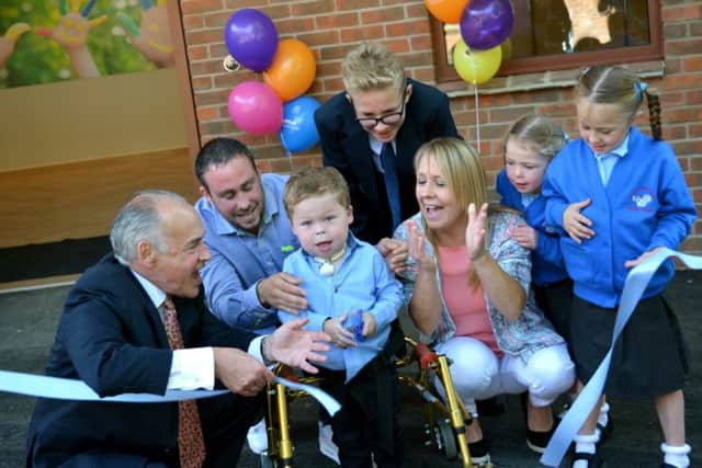 Five-year-old Mikey Strachan and his family, from Stubbington, officially open refurbished Naomi House in 2015