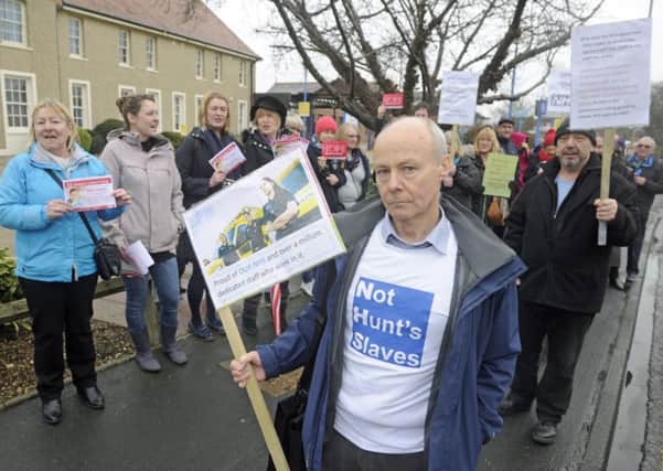 Mark Smith leads a group from the Gosport Labour Party as they stage a protest outside Gosport War Memorial Hospital highlighting the need for an A&E department.   
Picture: Ian Hargreaves (180190-1)