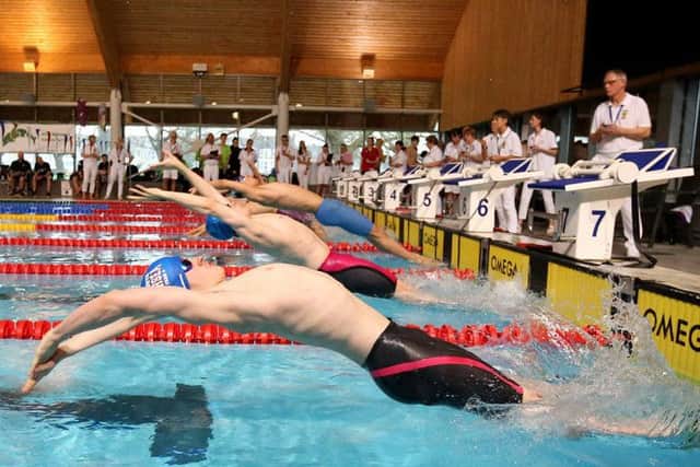 Alexander Edge, nearest camera, begins his backstroke bid. Picture: Chris Moorhouse
