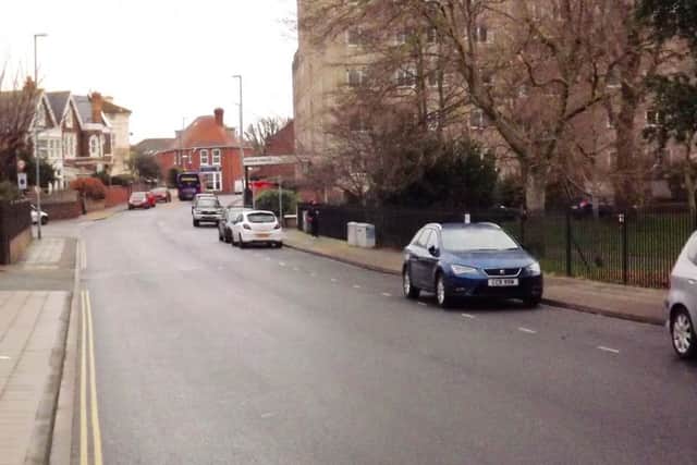 The same scene in Clarendon Road today. The houses to the left remain the same as does the park to the right.