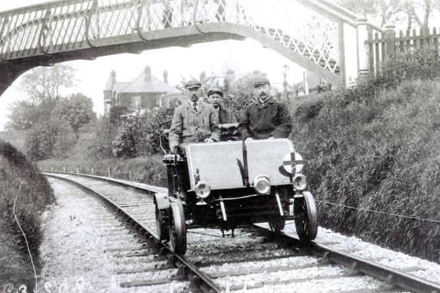 Engineers on a test vehicle check the newly relaid track on the Hayling Island branch. To the rear is the A27 (Barry Cox collection)