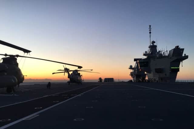HMS Queen Elizabeth on her way to Gibraltar. After leaving Gibraltar she will return to sea to conduct helicopter trials with specially equipped Merlin and Chinook aircraft. Picture: Royal Navy