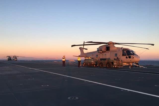 HMS Queen Elizabeth on her way to Gibraltar. After leaving Gibraltar she will return to sea to conduct helicopter trials with specially equipped Merlin and Chinook aircraft. Picture: Royal Navy