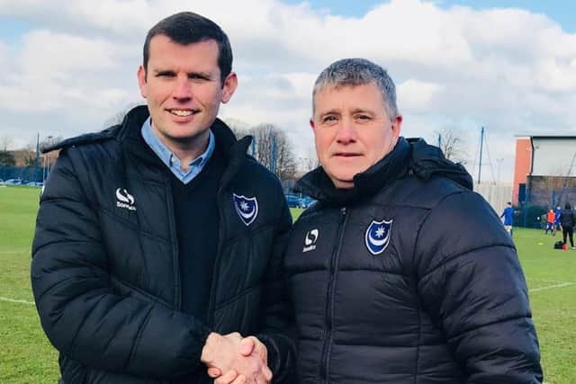 Dave Wright being welcomed to the club by academy boss Mark Kelly