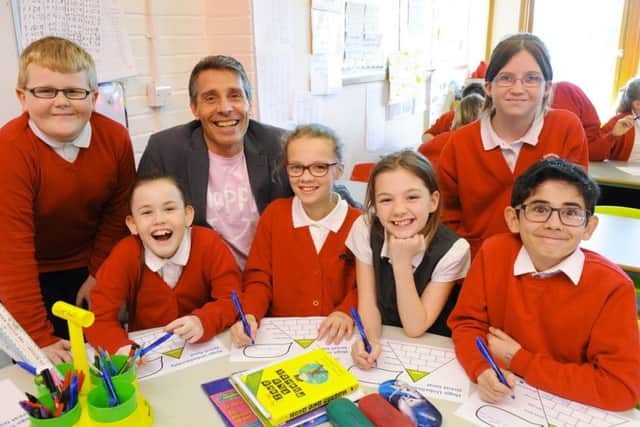 Dr Andy Cope - 'The Doctor of Happiness' - with Year 6 'Eagles' class at Newborn CofE Primary School. Picture by: Malcolm Wells (180125-4821)
