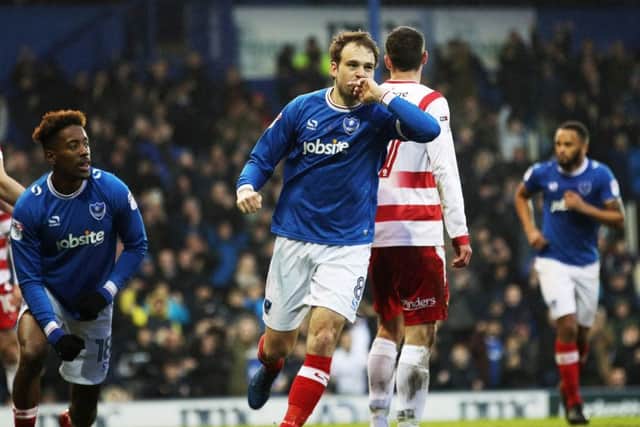 Striker Brett Pitman scores his first goal of the match against Doncaster Rovers at Fratton Park on February 3. Picture: Joe Pepler/Digital south.