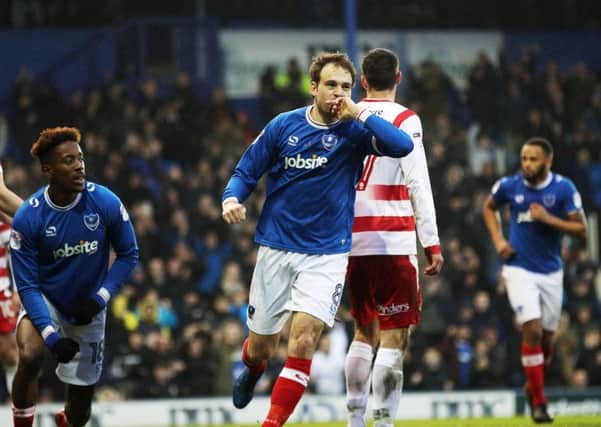 Striker Brett Pitman scores his first goal of the match against Doncaster Rovers at Fratton Park on February 3. Picture: Joe Pepler/Digital south.
