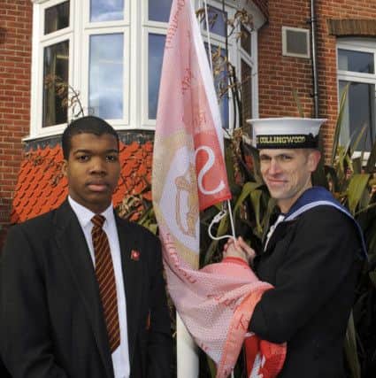 Wadood Alli with his escort from HMS Collingwood

Picture by:  Malcolm Wells (180205-5398)