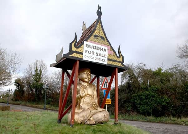 The giant Buddha statue for sale at the former Bahn Thai, Wickham Road, Fareham.  Picture: Habibur Rahman