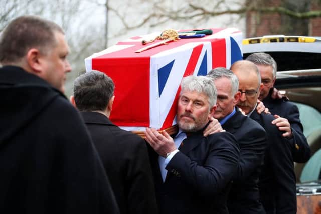 Surgeon Captain Rick Jolly's coffin being carried by men who served alongside him at the 'Red and Green Life Machine' during the Falklands conflict, at his funeral at HMS Raleigh in Torpoint, Cornwall Picture: LPhot Ken Gaunt/Royal Navy/MoD/Crown copyright/PA Wire