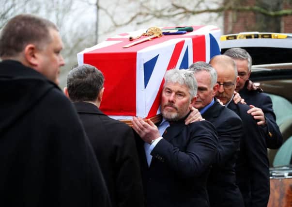Surgeon Captain Rick Jolly's coffin being carried by men who served alongside him at the 'Red and Green Life Machine' during the Falklands conflict, at his funeral at HMS Raleigh in Torpoint, Cornwall Picture: LPhot Ken Gaunt/Royal Navy/MoD/Crown copyright/PA Wire
