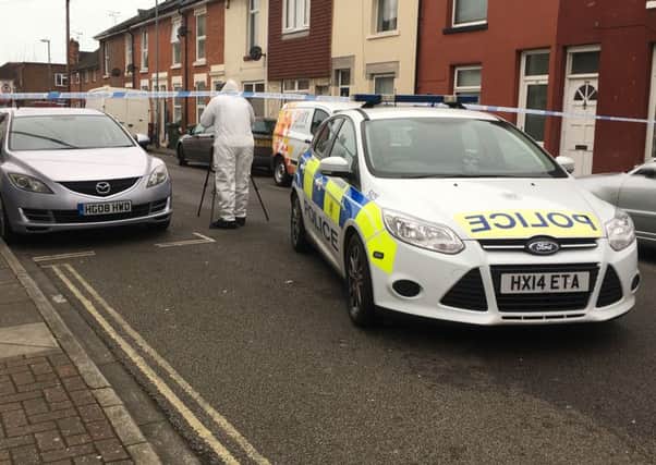Police scenes of crimes officers investigating in Fratton after the death of an 18-year-old man Picture: Tom Cotterill