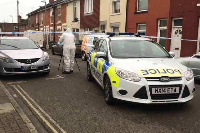 Police scenes of crimes officers investigating in Fratton after the death of an 18-year-old man