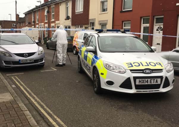 Police scenes of crimes officers investigating in Fratton after the death of an 18-year-old man