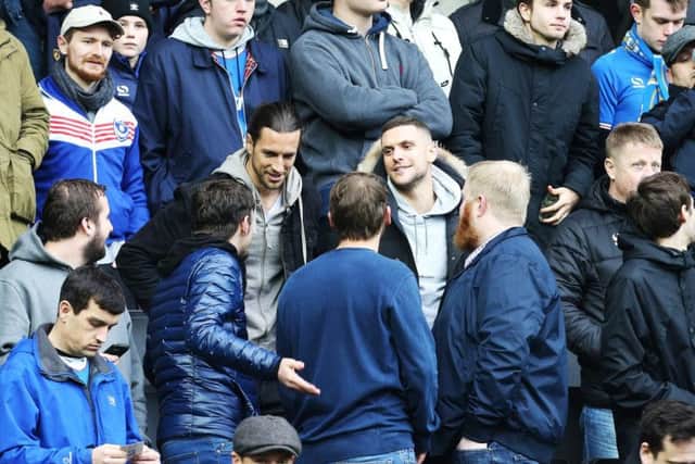Christian Burgess and Stuart O'Keefe were in the away end for today's visit to MK Dons