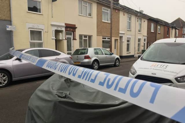 Police scenes of crimes officers investigating in Fratton after the death of an 18-year-old man