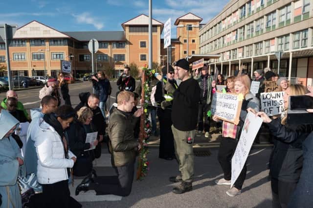The two protest groups face eachother in the grounds of St Mary's Hospital. Picture: Vernon Nash