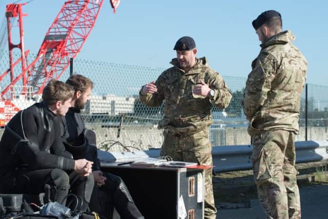 Explosive Ordnance Disposal units from the Royal Navy dispose of a CT-500 500lb bomb from Second World War