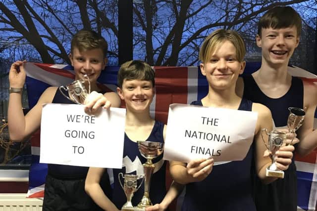 Boys from Priory School in a trampoline competition