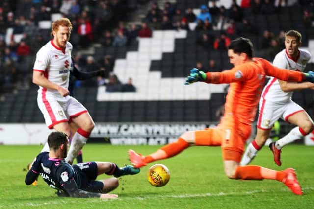 Conor Chaplin grabs Pompey' s late winner. Picture: Joe Pepler