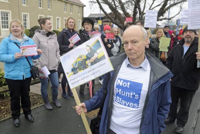 Mark Smith leads a group from the Gosport Labour Party as they stage a protest outside Gosport War Memorial Hospital highlighting the need for an A&E department
Picture: Ian Hargreaves  (180190-1)